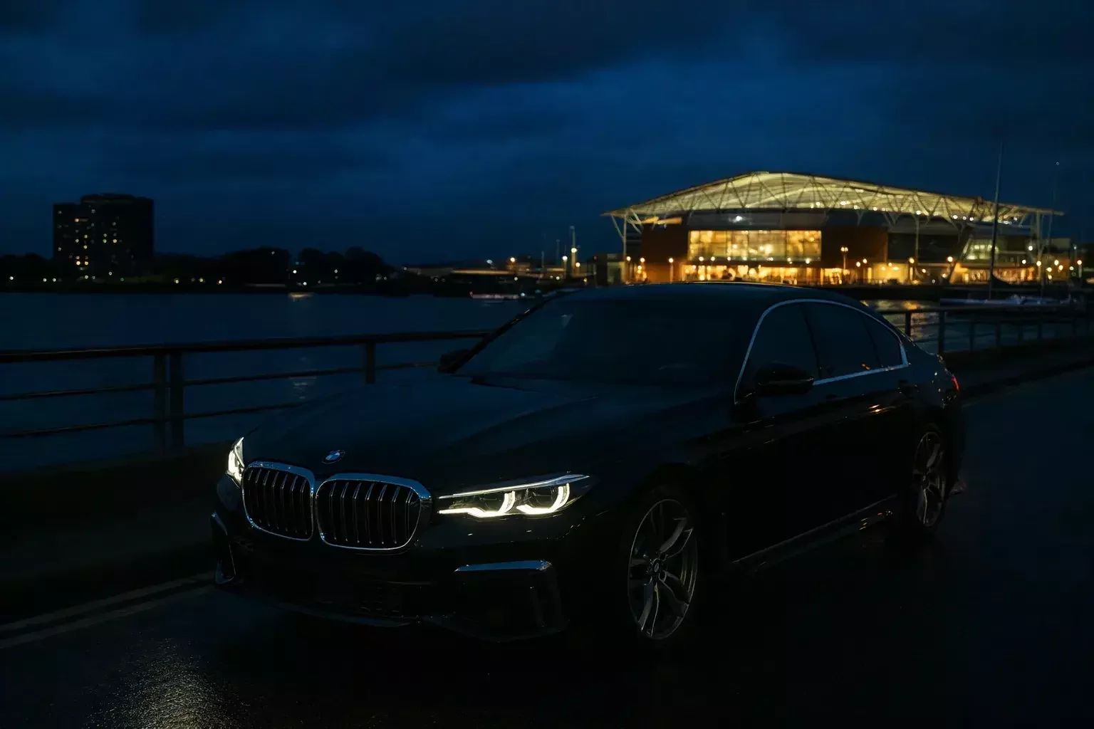 Chauffeur-driven luxury cruising through Southampton by night, travel in total comfort.